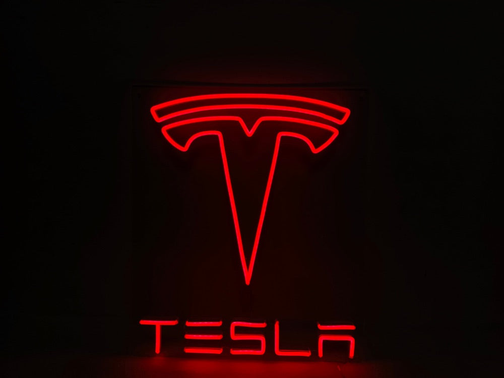 Finished Tesla logo neon sign glowing in red